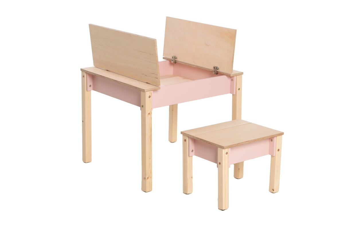 15. Pink and natural wood children's table and chair set with both storage compartments open on white background