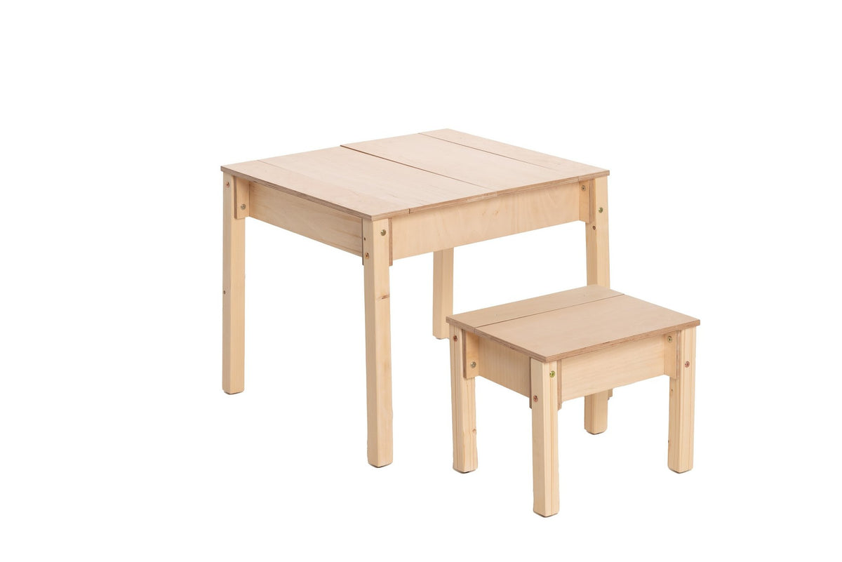 2. Studio shot of children's smart storage table and chair set in light wood, closed storage compartments