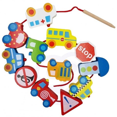 5. Flat lay of colorful wooden vehicle blocks and road signs with threading string