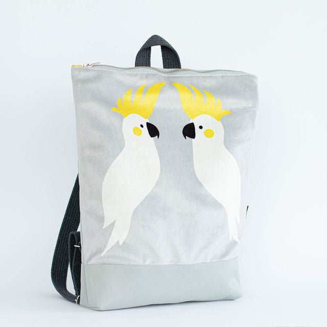 4. Studio shot of Muni Cockatoo backpack in grey velvet with cockatoo design, showing front view