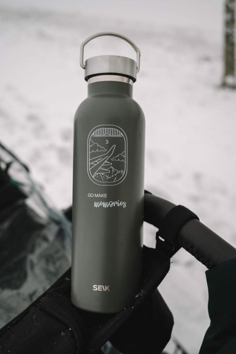 1. SEIK water bottle thermos in green with 'Go Make Some Memories' design, shown outdoors on a snowy day