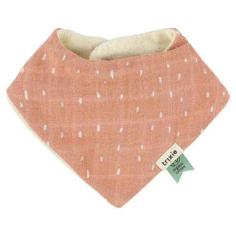 5. Peach Trixie Baby bandana bib with white dots and organic cotton tag, shown on white background