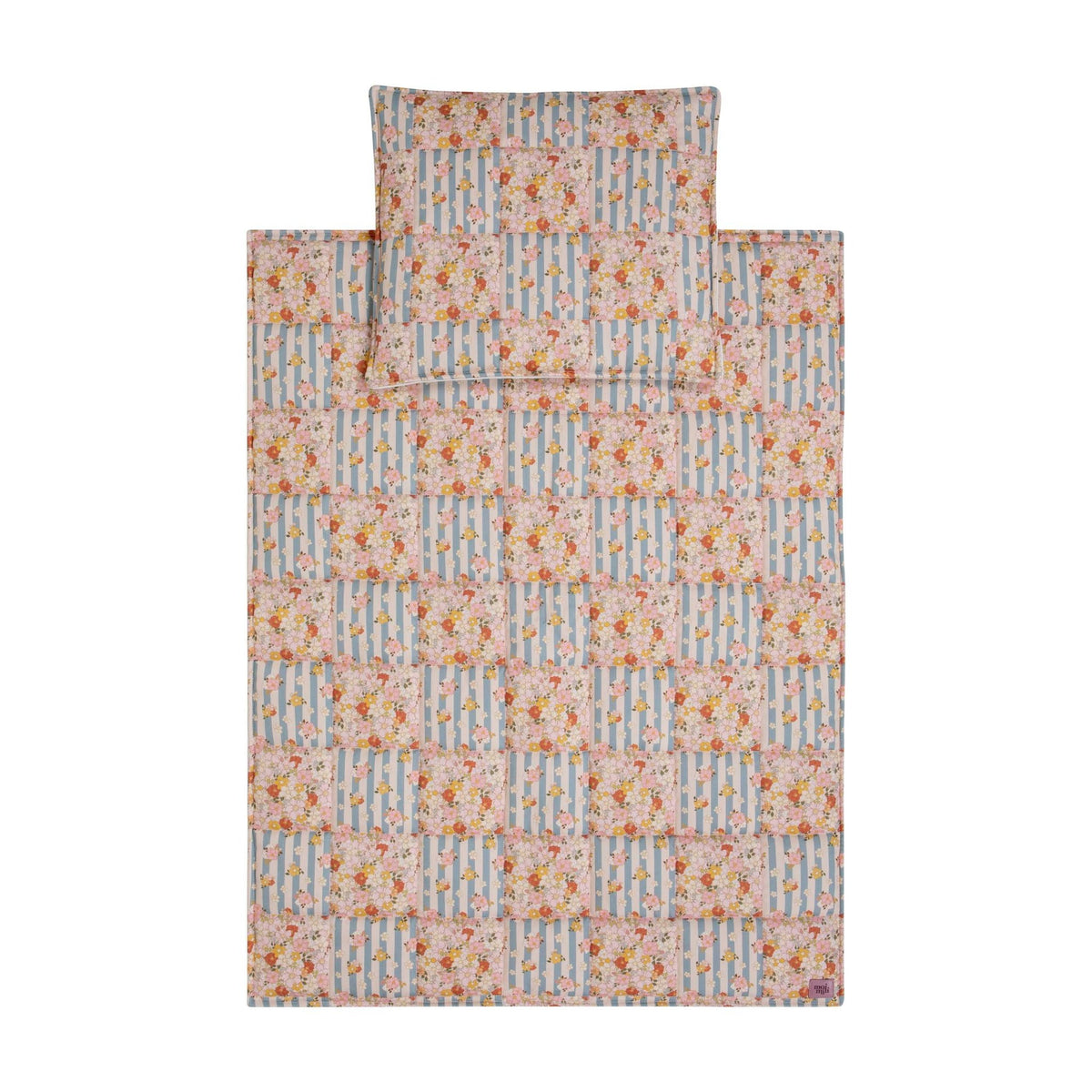 6. Flat lay of cotton quilted patchwork blanket and pillow set with floral and striped design