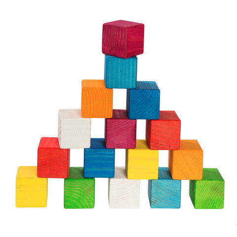 3. Pyramid stack of rainbow-colored wooden blocks, emphasizing the vibrant child-friendly stain and durable design by ROOSI Traditional Toys