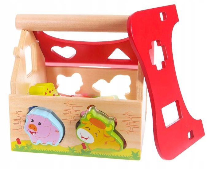 2. Open wooden farmhouse shape sorter with red roof removed, showing animal shapes and cutouts for educational play