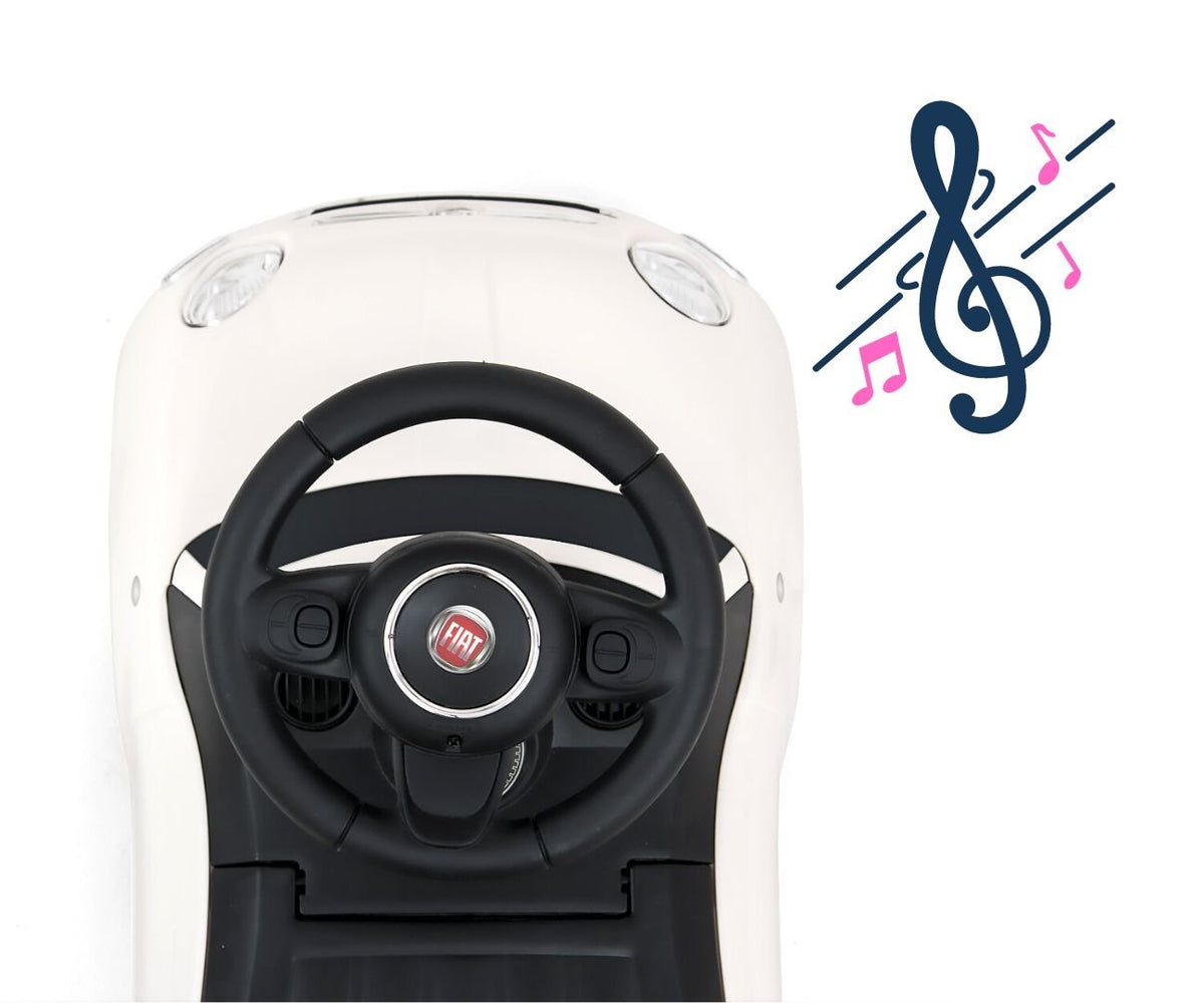 3. Top view of black steering wheel with Fiat logo and musical notes indicating sound feature