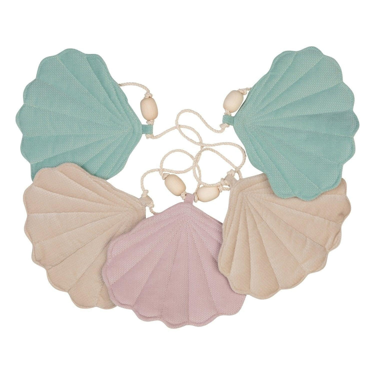 8. Studio shot of pastel velvet shell pendants arranged in a circle on a white background