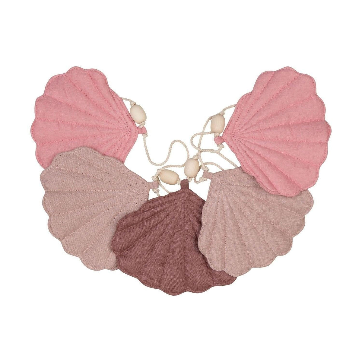 3. Studio shot of powder pink shell garland with five linen pendants in pink shades arranged in a fan shape