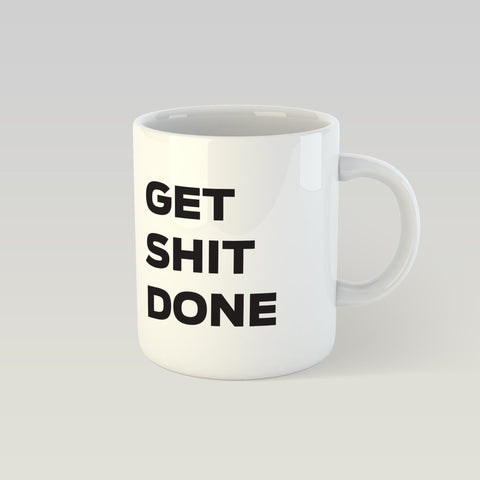 2. SEIK Design Mug with 'GET SHIT DONE' text, studio shot highlighting white ceramic and bold typography