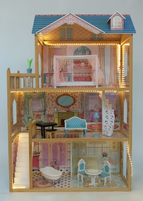 2. Wooden dollhouse with LED lights on, showcasing three floors with detailed rooms and furniture