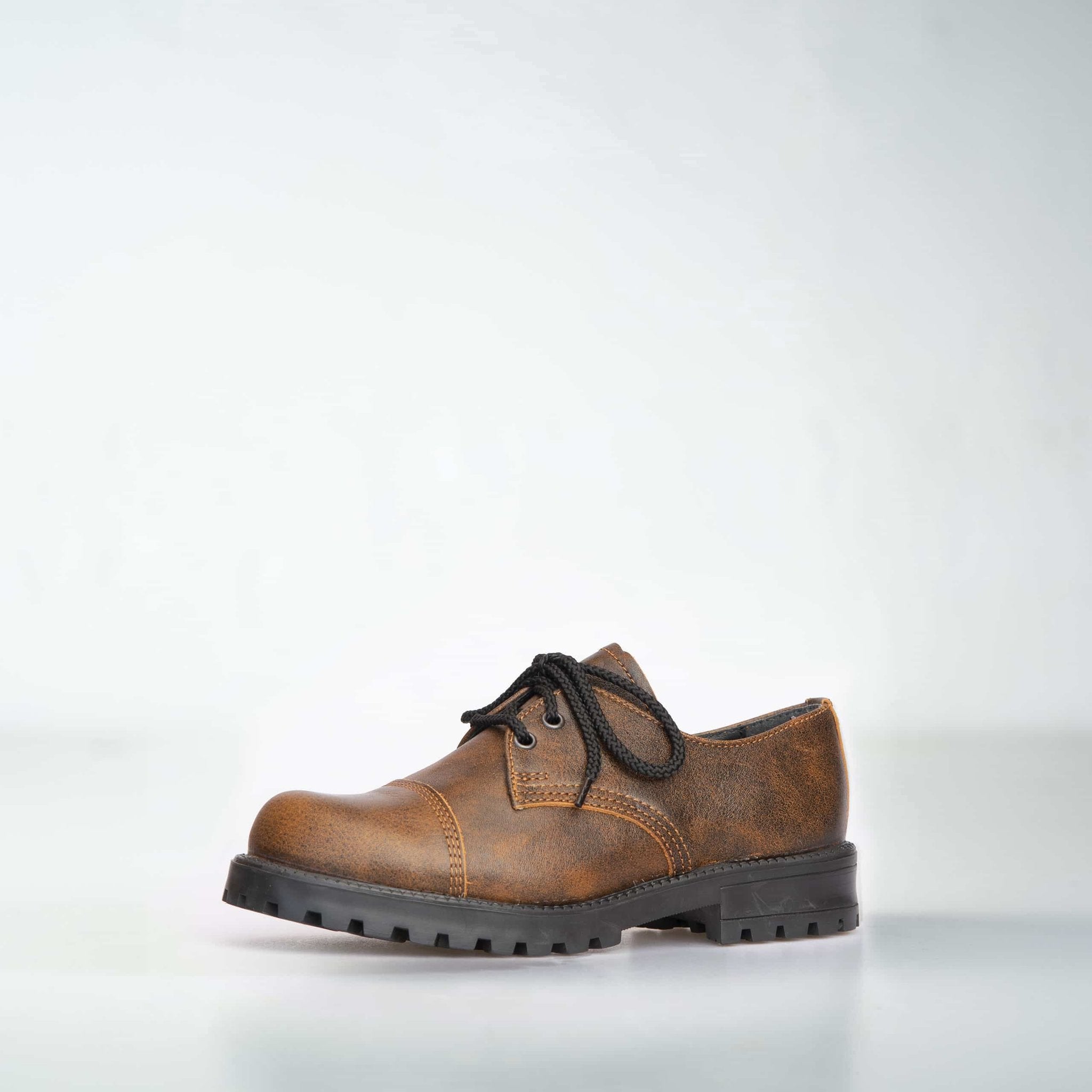 1. Unisex light brown leather Samelin Widgets in studio setting, showcasing military-grade quality and robust design