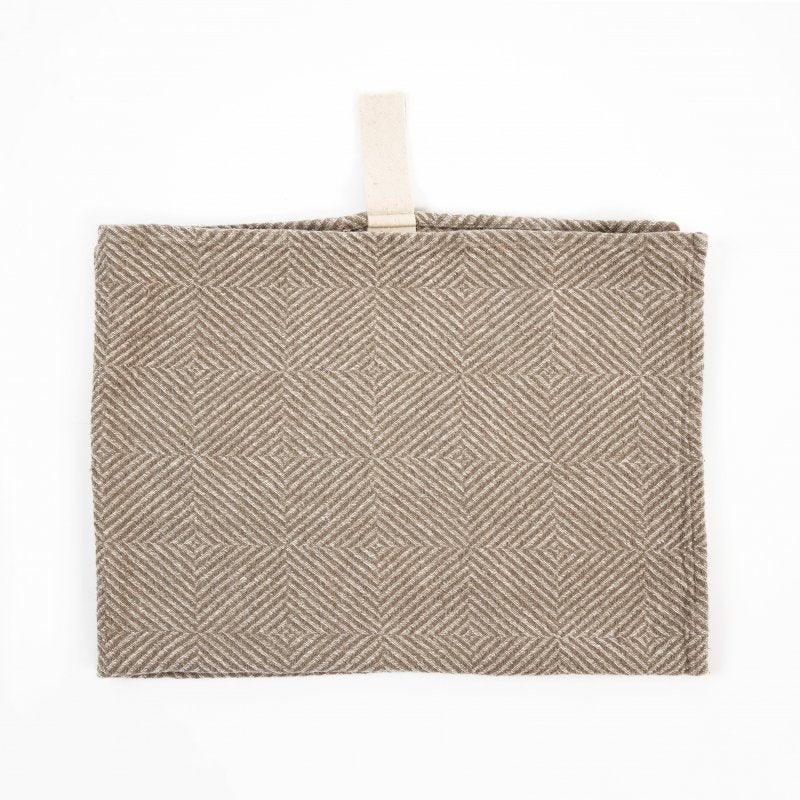 1. Beige linen towel with checkered fishbone pattern and white cotton hanger on white background