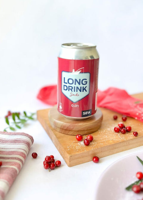5. SEIK Long Drink Socks in cranberry with can, styled with cranberries and wooden board
