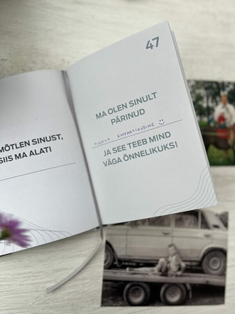 3. Close-up of SEIK '100 ASJA, MIDA ISA JUURES ARMASTAN' book page 47 with heartfelt message, accompanied by vintage photos