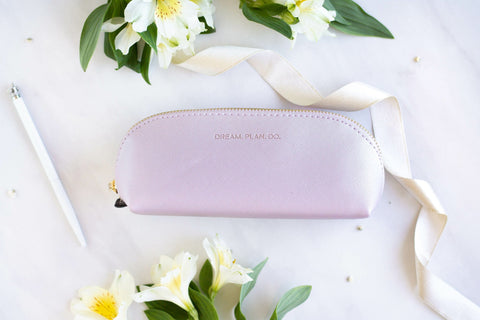 1. SEIK purple pencil case with 'DREAM. PLAN. DO.' text, styled with flowers and ribbon