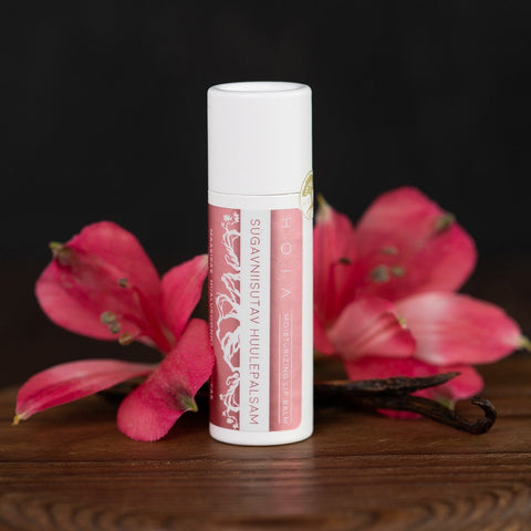 3. HOIA homespa deeply hydrating lip balm with pink flowers and vanilla pod, highlighting natural ingredients