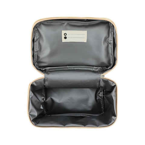 2. Interior view of Trixie Baby Mrs. Unicorn thermal lunch bag showing black isothermal lining and name tag slot