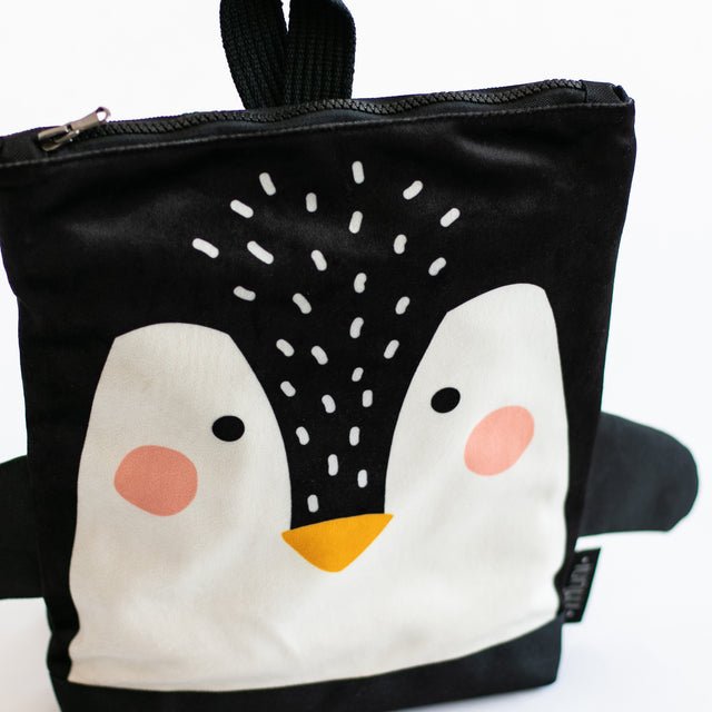 5. Close-up of Muni Penguin backpack showing cute penguin face design