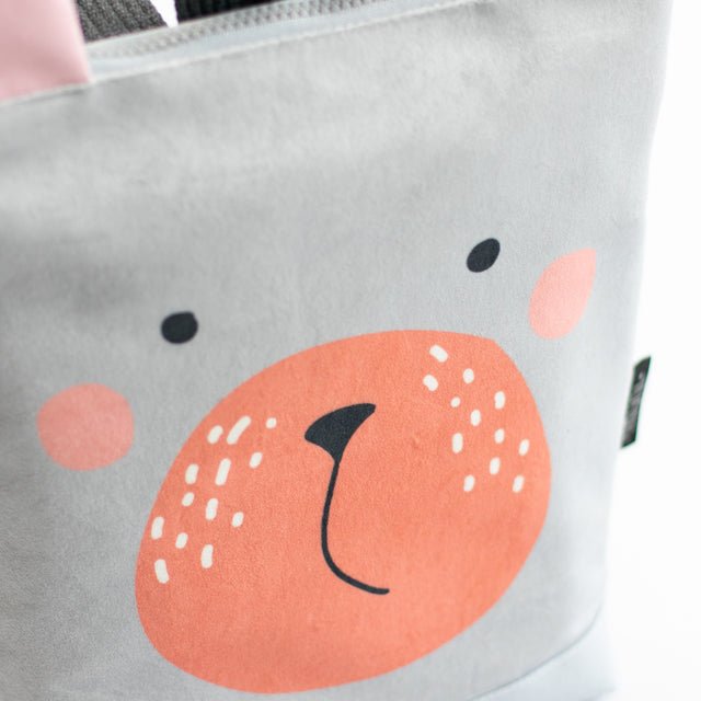10. Close-up of Muni Bunny kids backpack interior, featuring 'Made for Adventure' label