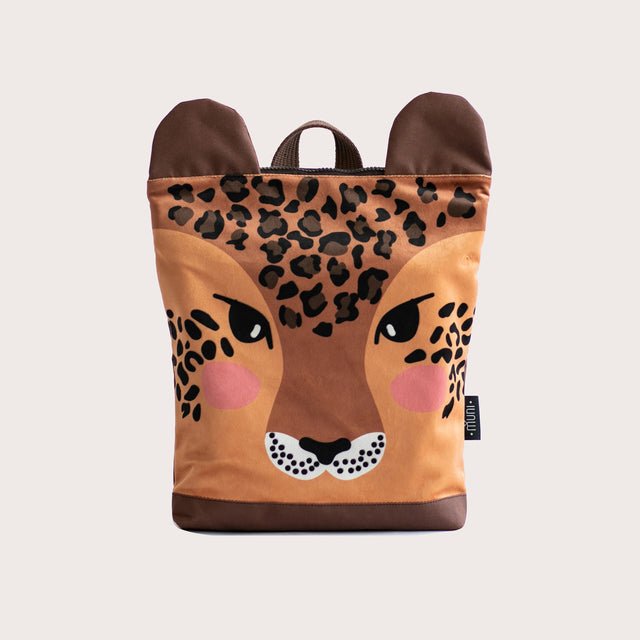 5. Muni kids leopard backpack, front view showing playful face design in studio