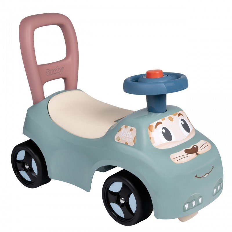 2. Smoby Little Ride-on Pusher in pastel colors with a horn and storage seat, shown in studio setting