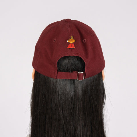 5. Studio back view of red Little My Dad Cap by Moomin, highlighting embroidery and strap