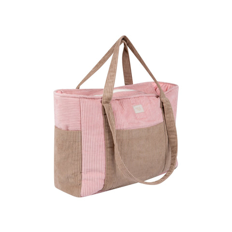 5. Side view of pink and coffee-colored weekender bag with dual handles in studio setting
