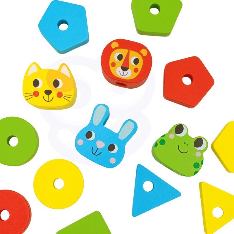 9. Flat lay of colorful animal and geometric blocks from Montessori puzzle pyramid