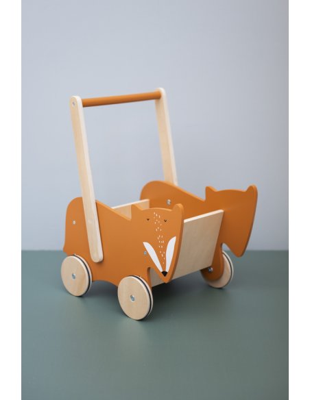 3. Studio shot of wooden cart with Mr. Fox design on a green surface