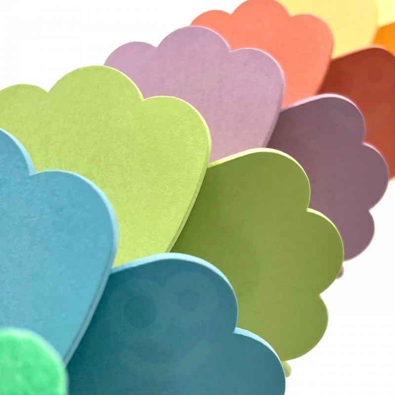 7. Close-up of pastel rainbow petals on wooden ball track