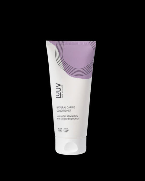 3. Studio shot of LUUV Natural Nourishing Conditioner with Plum Oil, 200 ml, on black background