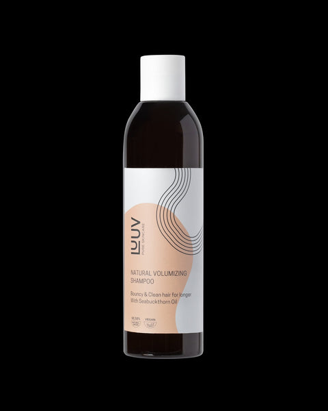 2. Studio image of LUUV Natural Sea Buckthorn Shampoo, highlighting vegan and eco-certified packaging