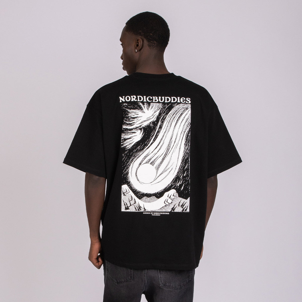 3. Back view of male model in black Moomin t-shirt with NordicBuddies design