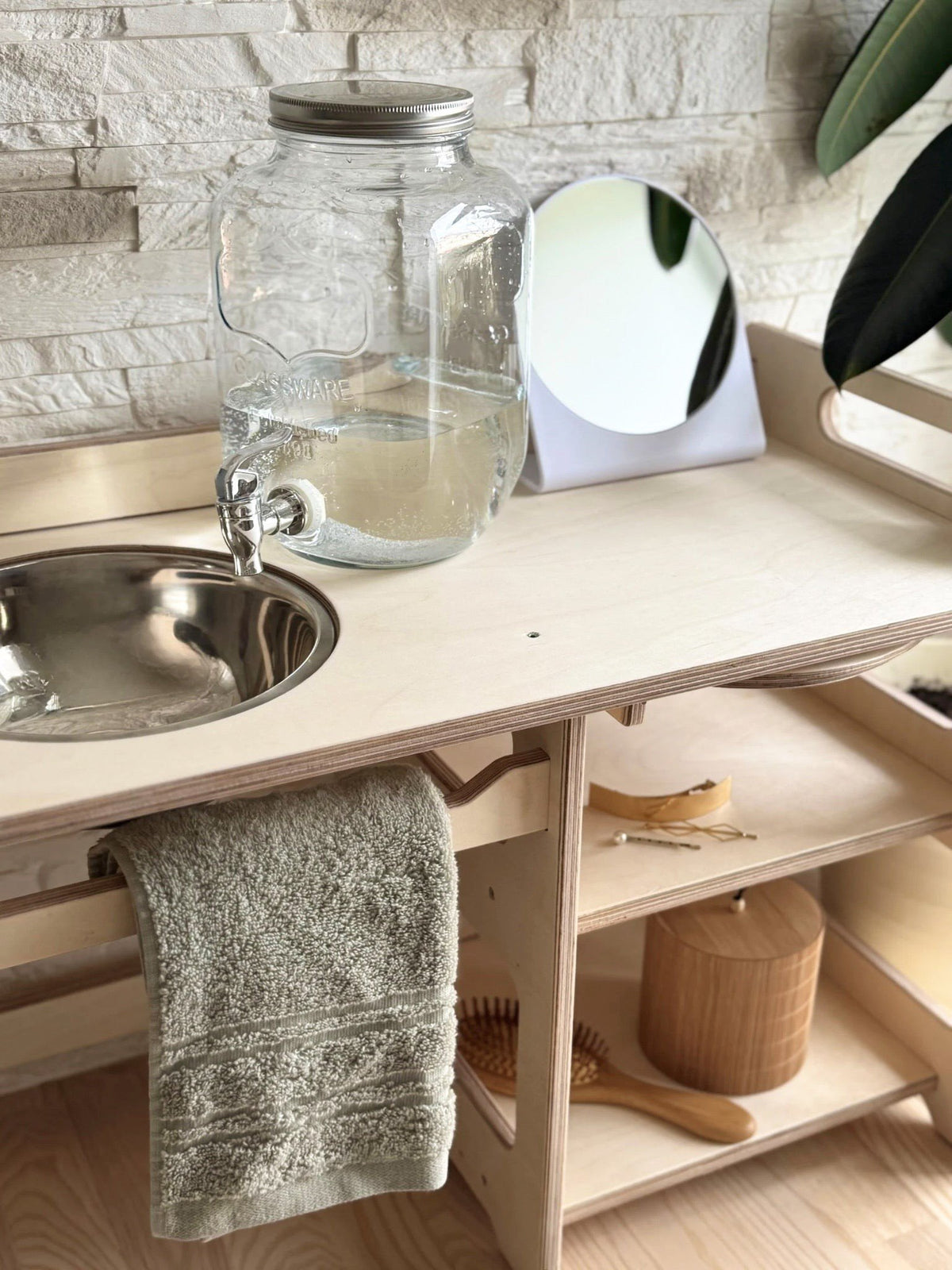 3. Montessori washbasin with enamel bowl, towel, and mirror on a wooden stand