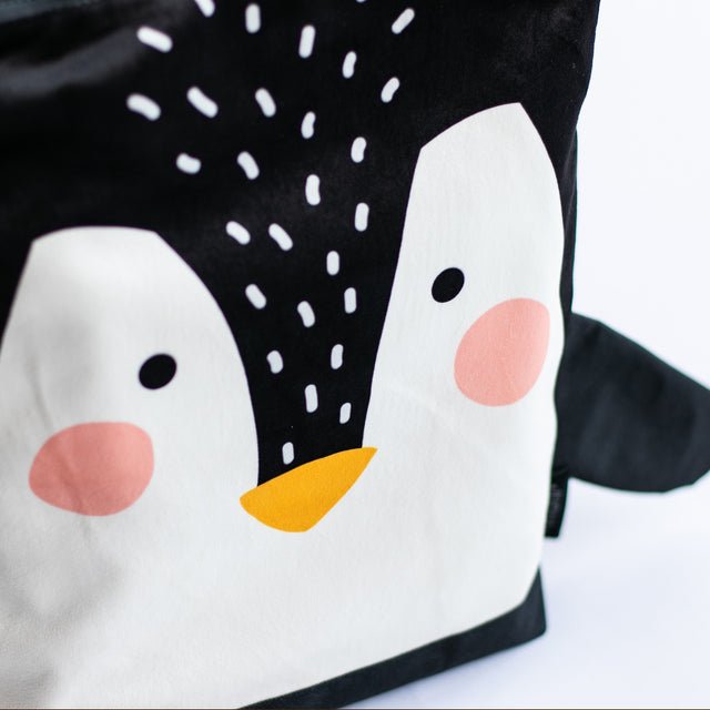 6. Detailed view of Muni Penguin backpack highlighting printed design