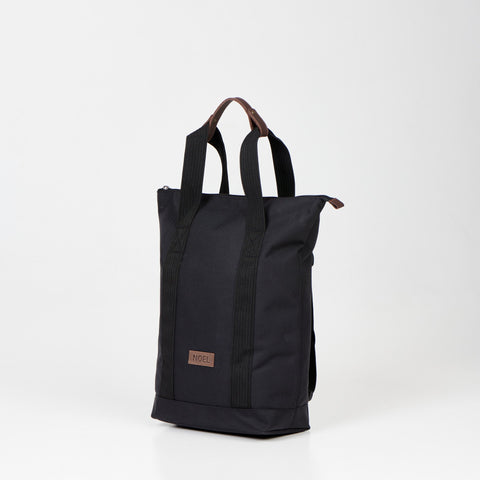 2. Black Noel 3in1 bag displayed as a shoulder bag with handles in studio