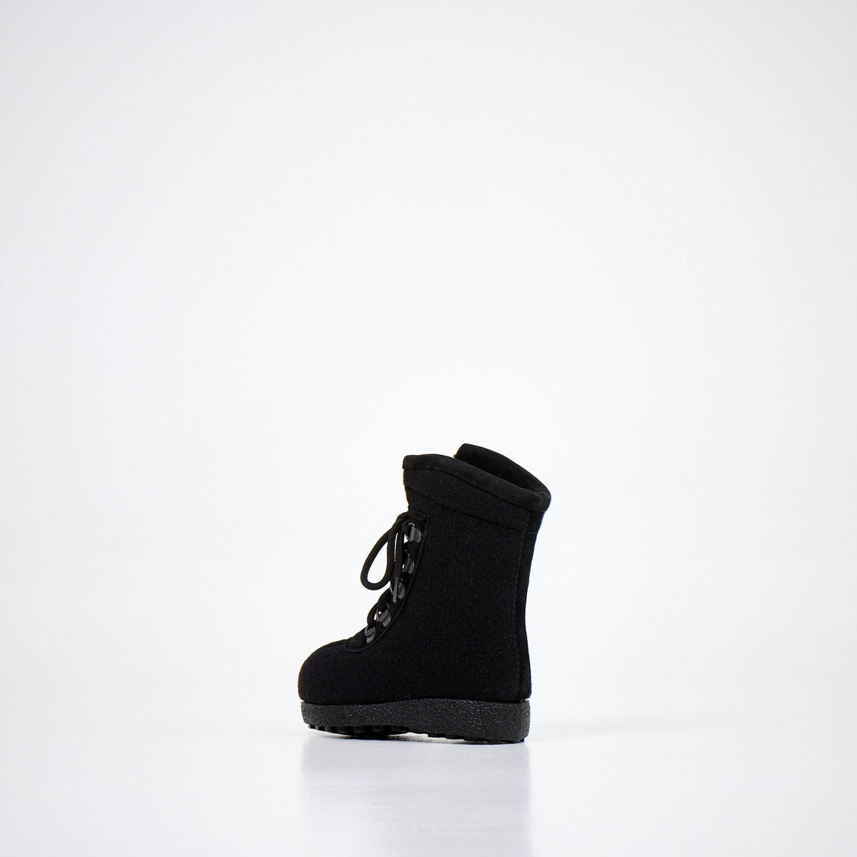 2. Black kids' felt boot with lace-up design, angled side view on white background