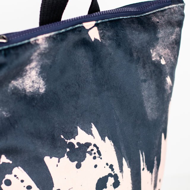 6. Close-up of Muni Watercolor backpack showing pink and navy blue watercolor design