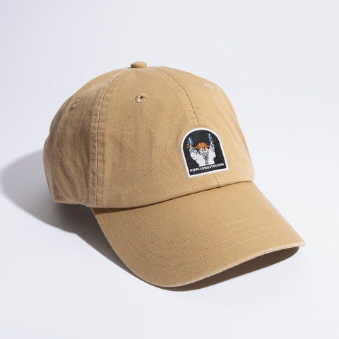 3. Studio shot of Pippi And The Bang Dad Cap in sand color, featuring Pippi Longstocking patch