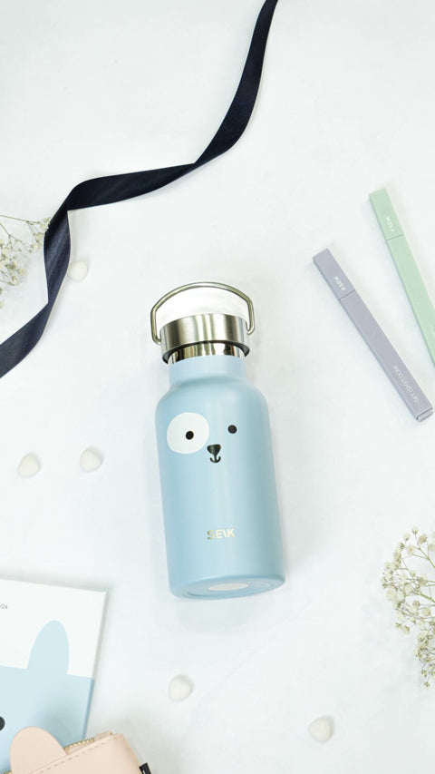 4. SEIK blue puppy-themed thermos, 350ml, styled with accessories in studio setting