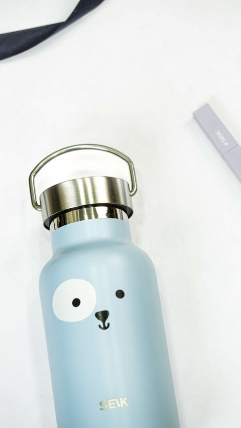 3. SEIK blue stainless steel water bottle with puppy design, 350ml, shown in studio