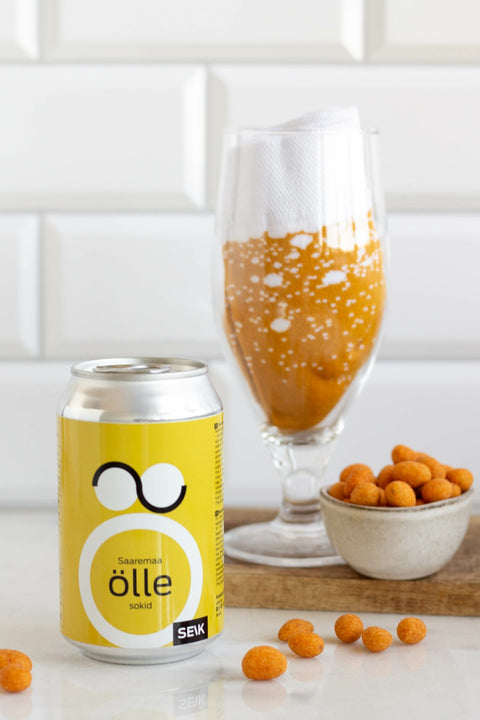 5. SEIK Saaremaa ƶllesokid in beer glass with can and snacks, highlighting creative presentation