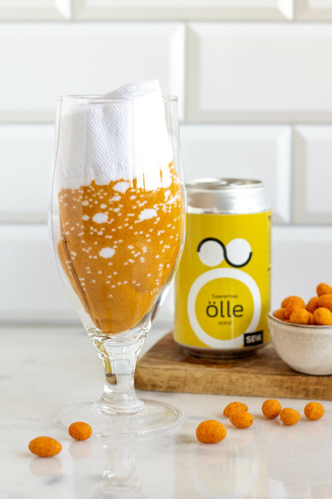 1. Saaremaa ƶllesokid by SEIK displayed in a beer glass with a can and snacks, showcasing unique packaging