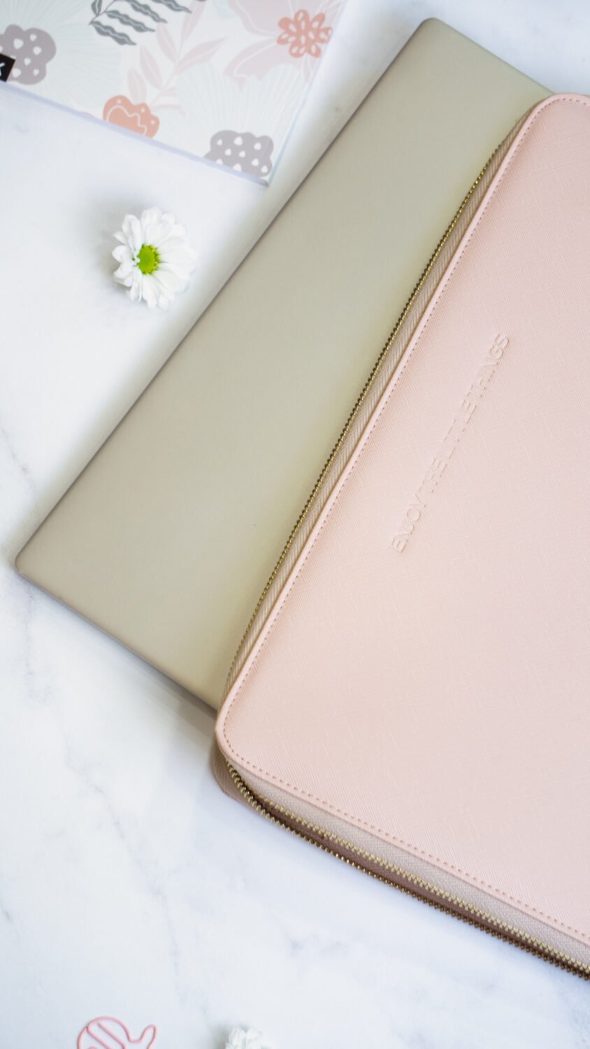 6. SEIK pink laptop sleeve on top of a laptop, showing protective fit