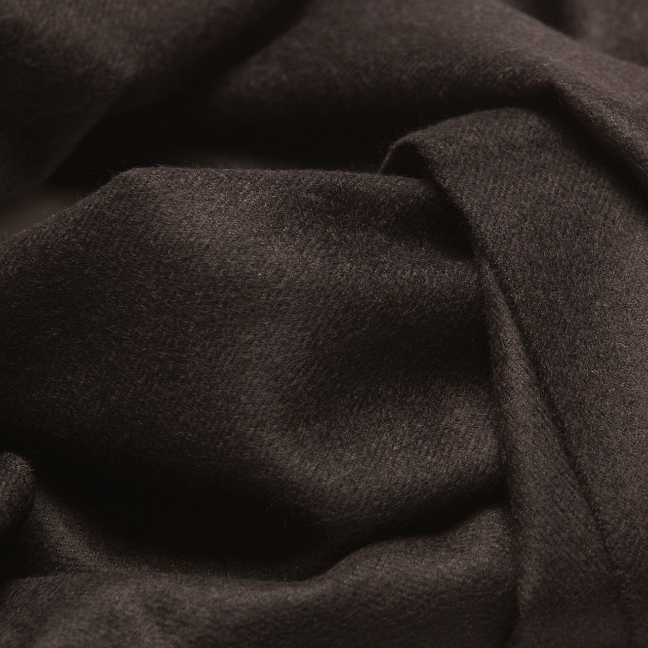 15. Close-up of black Alpaka baby alpaca wool fabric texture