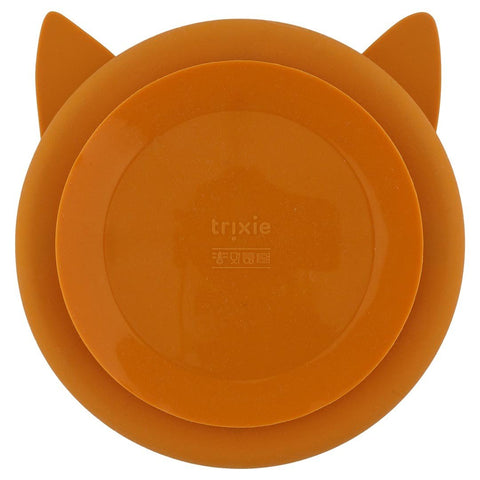 2. Back view of orange silicone suction plate with Trixie logo, showcasing strong suction base for secure placement.