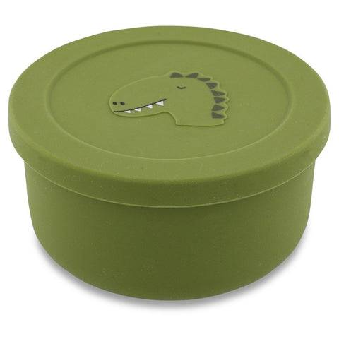 1. Green silicone snack container with dinosaur design on lid, by Trixie Baby, shown in studio setting