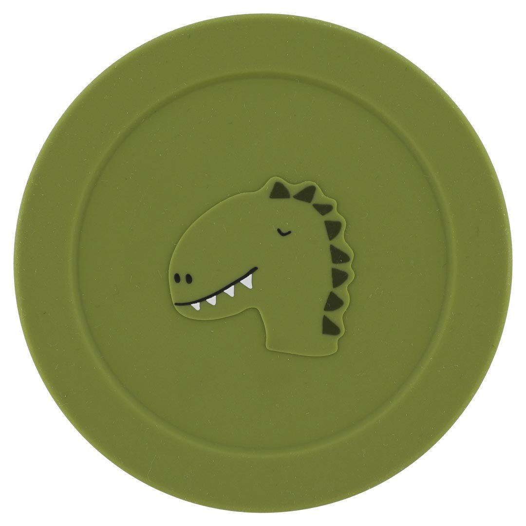4. Top view of green silicone lid with dinosaur design, part of snack container by Trixie Baby