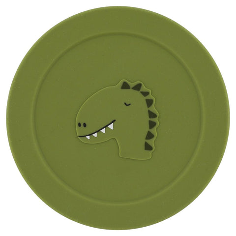 4. Top view of green silicone lid with dinosaur design, part of snack container by Trixie Baby