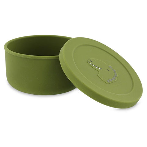 3. Green silicone snack container with lid removed, showing interior, featuring dinosaur design, by Trixie Baby